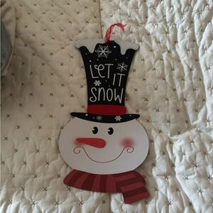 Festive Snowman Wall Decor with Black and Red Hat